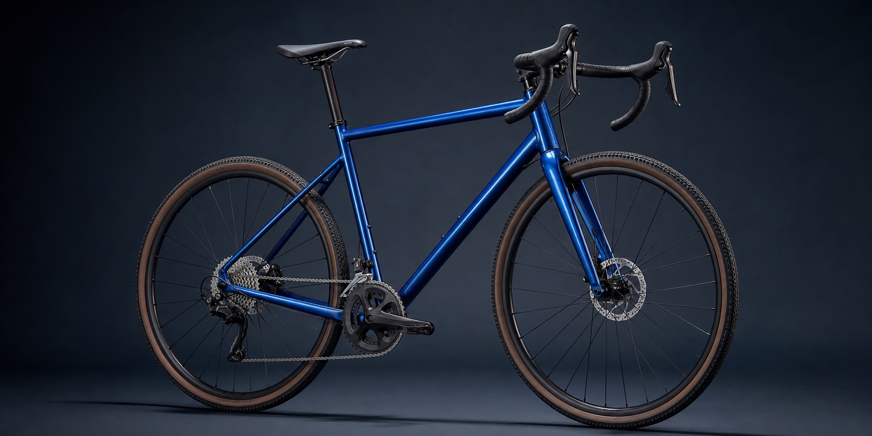 Fictional metallic blue gravel bicycle photographed in a studio